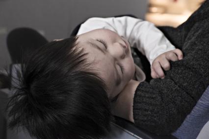 Parent holding child